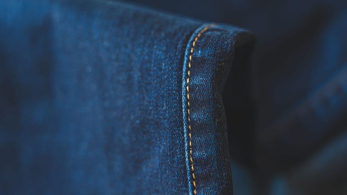 Close-up of topstitching on a denim seam
